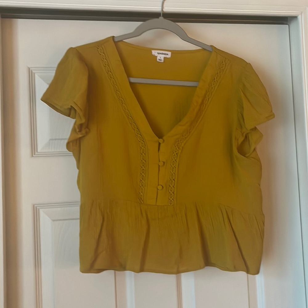 Yellow babydoll style top with lace accent and buttons